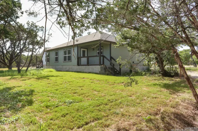 a house view with a outdoor space