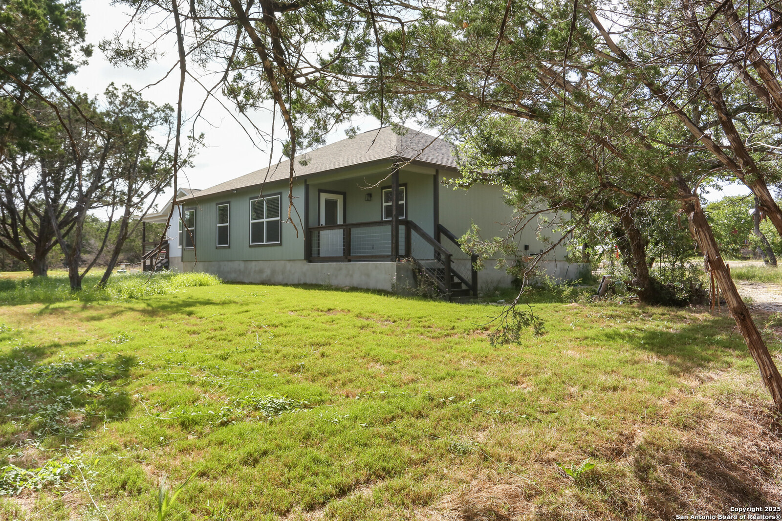 150 Hill Drive Spring Branch, TX 78070 - Photo 20 of 21 a house view with a outdoor space