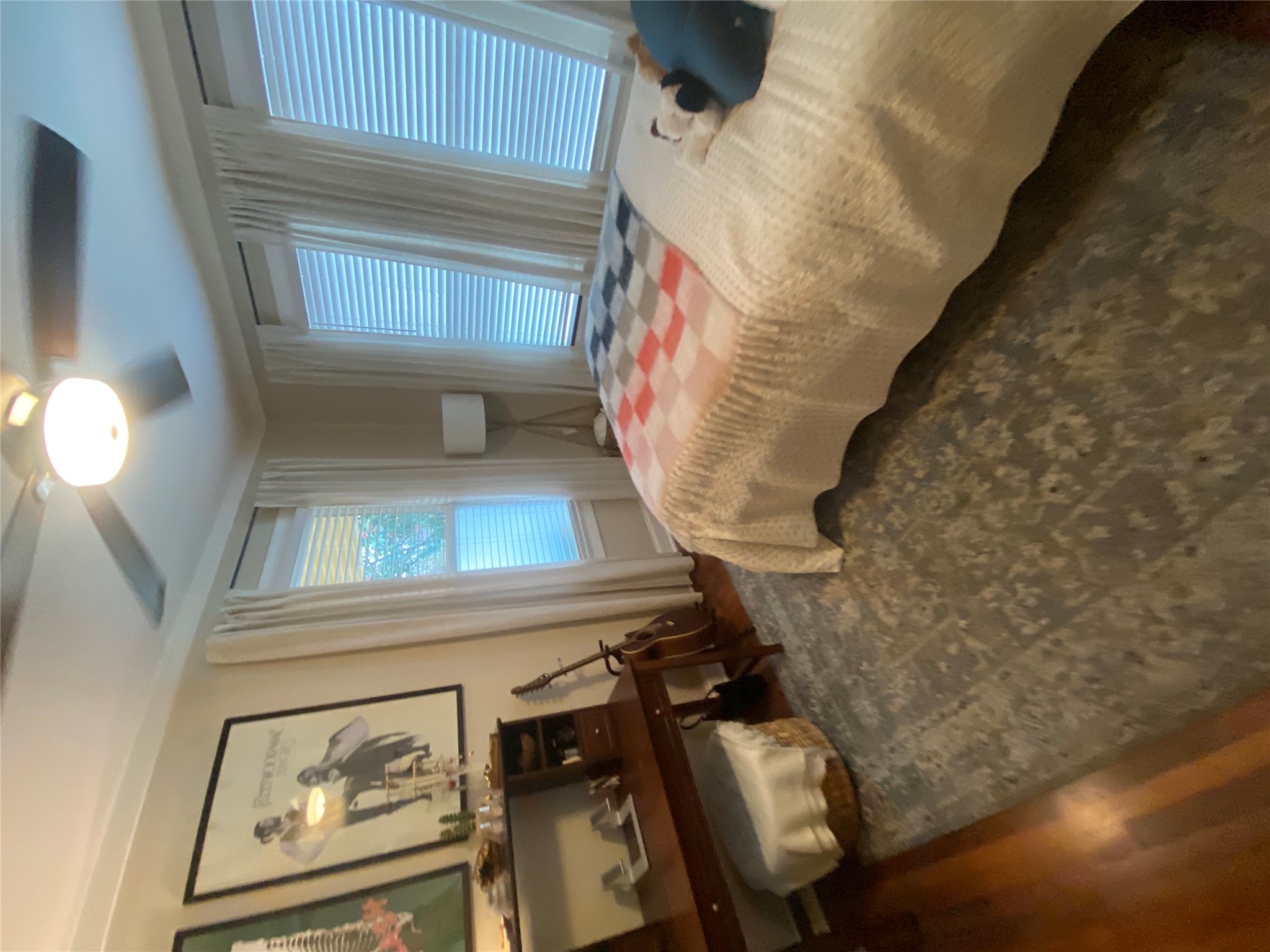 3010 Fruth Street, Unit A Austin, TX 78705 - Photo 31 of 39 Bedroom with hardwood flooring, crown molding, and a ceiling fan with integrated lighting