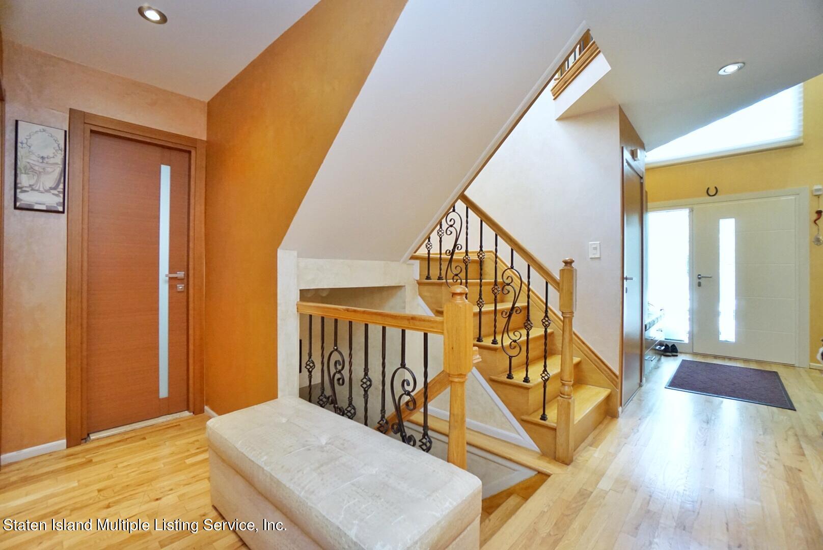 67 Covington Circle Staten Island, NY 10312 - Photo 20 of 45 a view of entryway with wooden floor