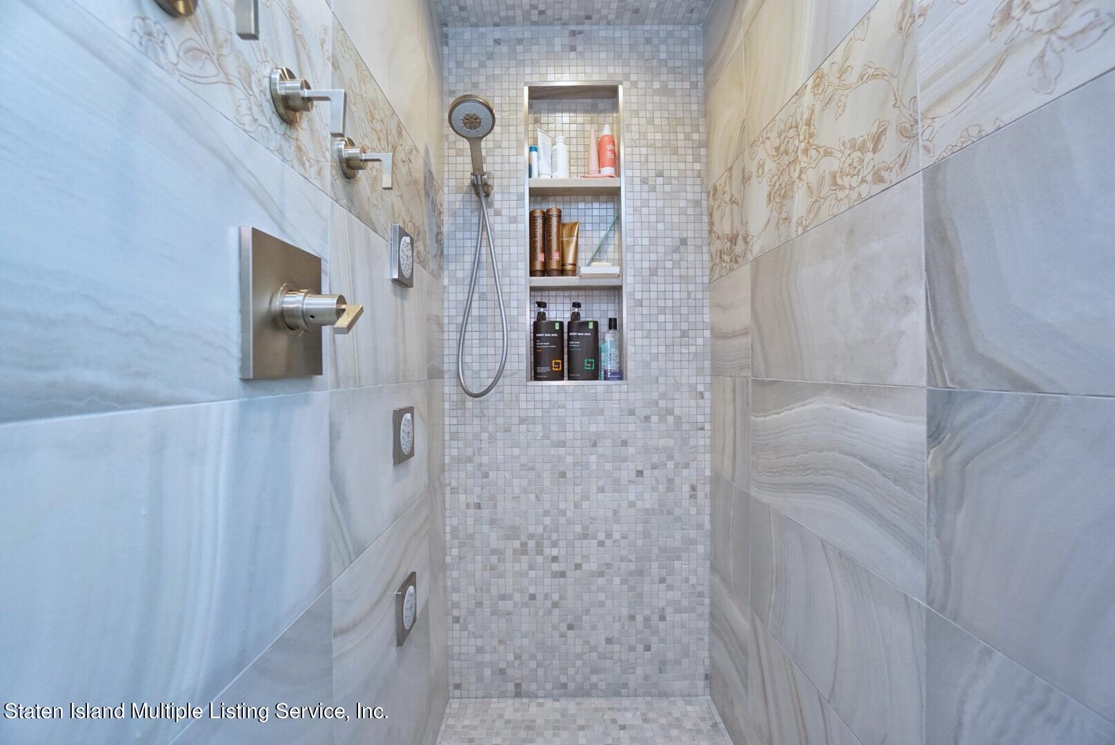 67 Covington Circle Staten Island, NY 10312 - Photo 27 of 45 a bathroom with a shower