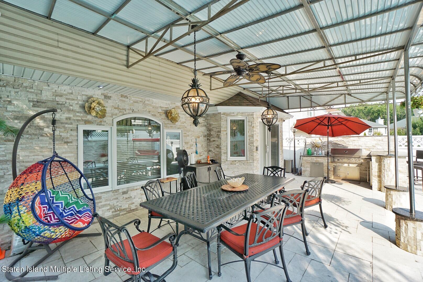 67 Covington Circle Staten Island, NY 10312 - Photo 4 of 45 an outdoor space with seating