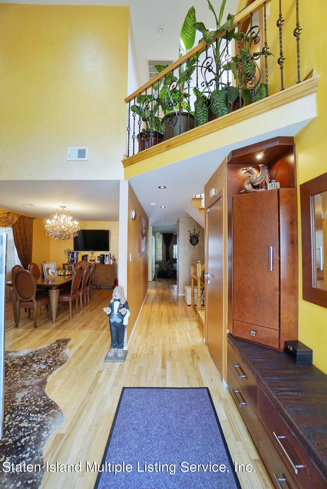 67 Covington Circle Staten Island, NY 10312 - Photo 7 of 45 a very nice looking room with a large window