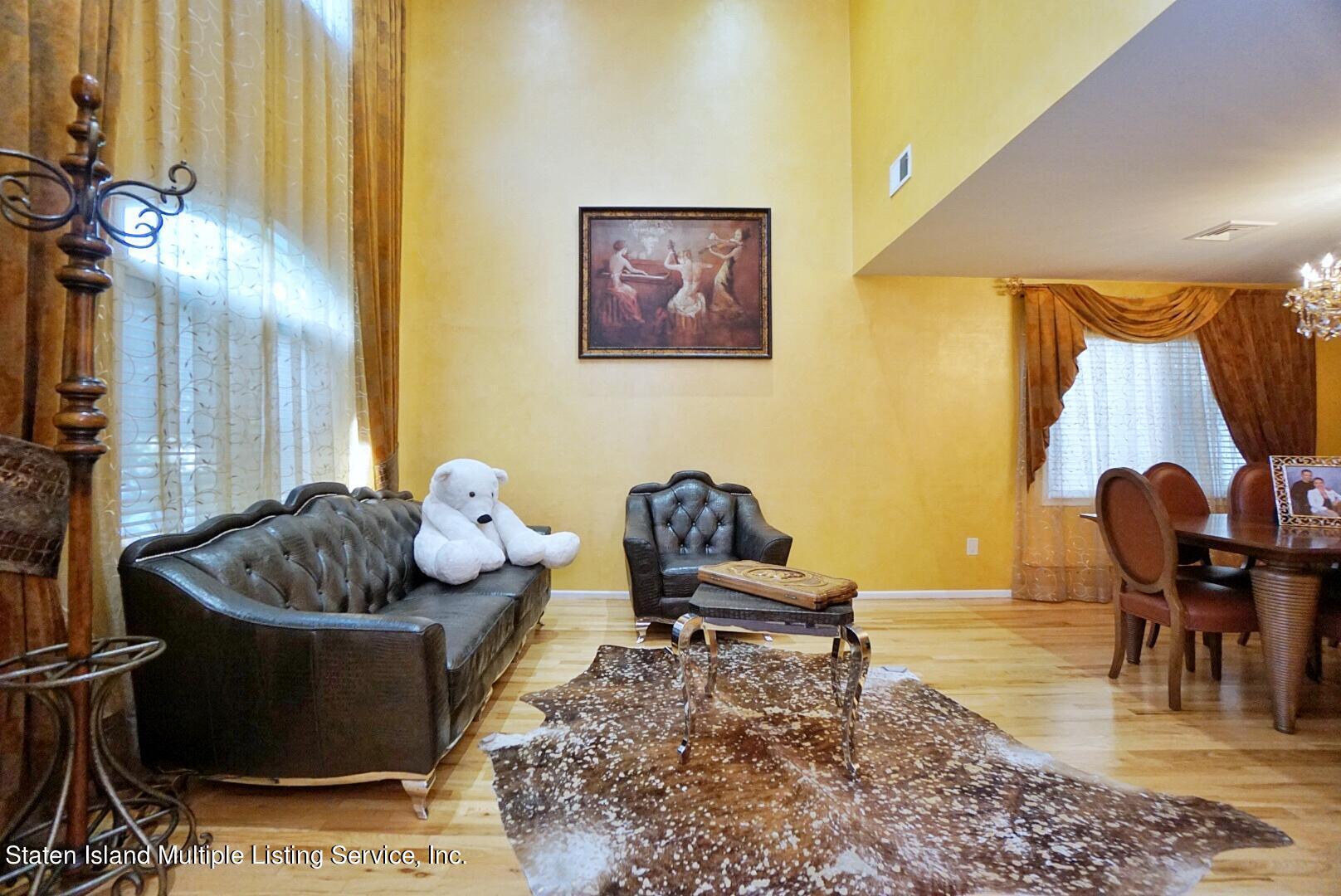 67 Covington Circle Staten Island, NY 10312 - Photo 8 of 45 a living room with furniture and a couch