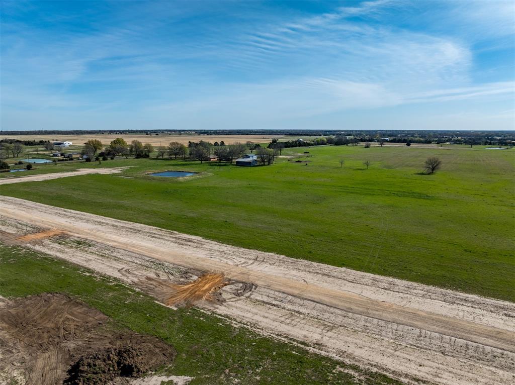 161 Private Road Sumner, TX 75486 - Photo 5 of 9 a view of a lake with a big yard
