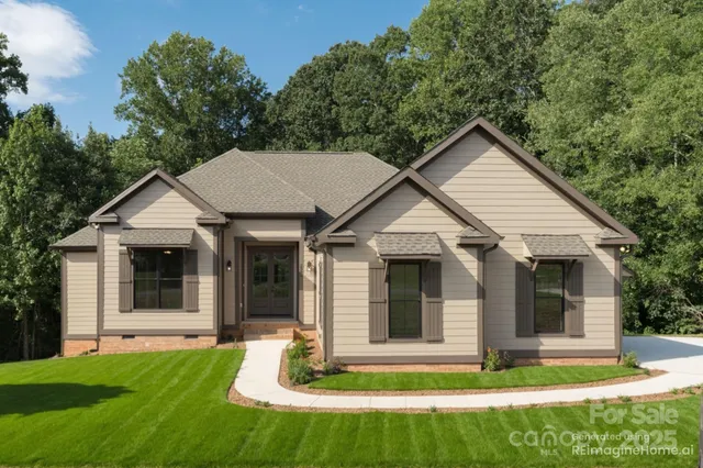 a view of a white house next to a yard with plants and trees