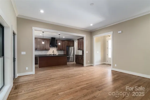 a large bathroom with a sink and a large mirror