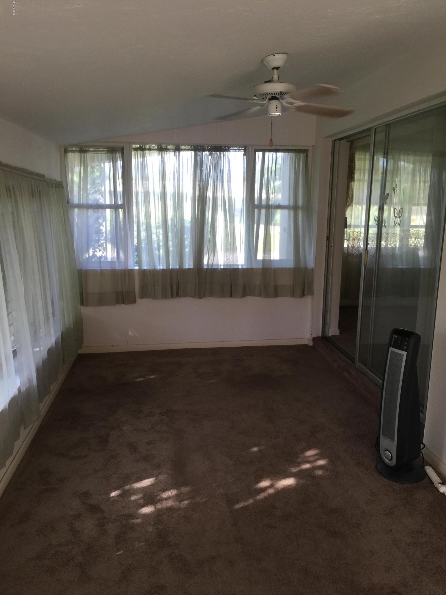 2402 Allan Adale Road Melbourne, FL 32935 - Photo 8 of 23 a view of room with window