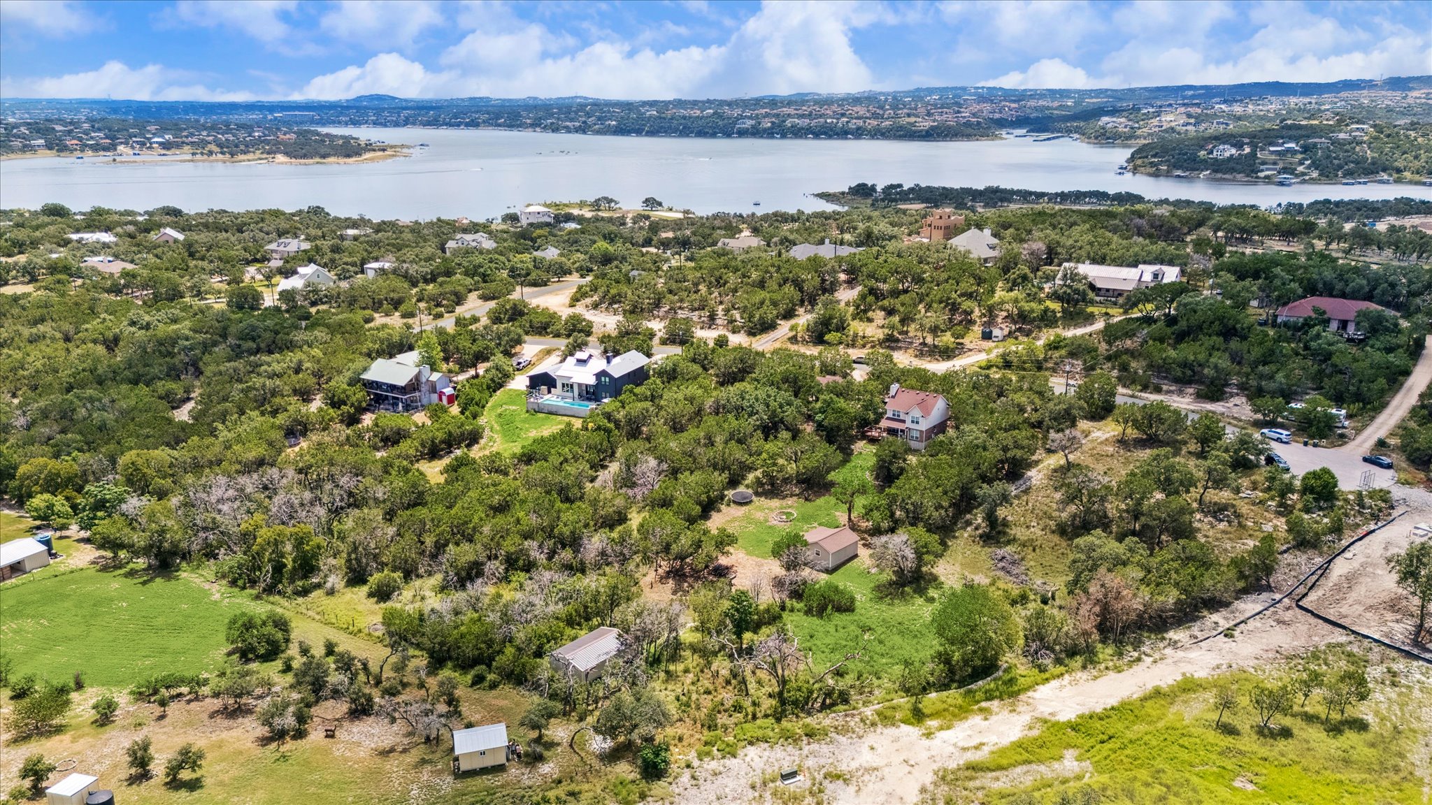 1102 Debco Lane Spicewood, TX 78669 - Photo 1 of 10 Aerial view of a nearby body of water