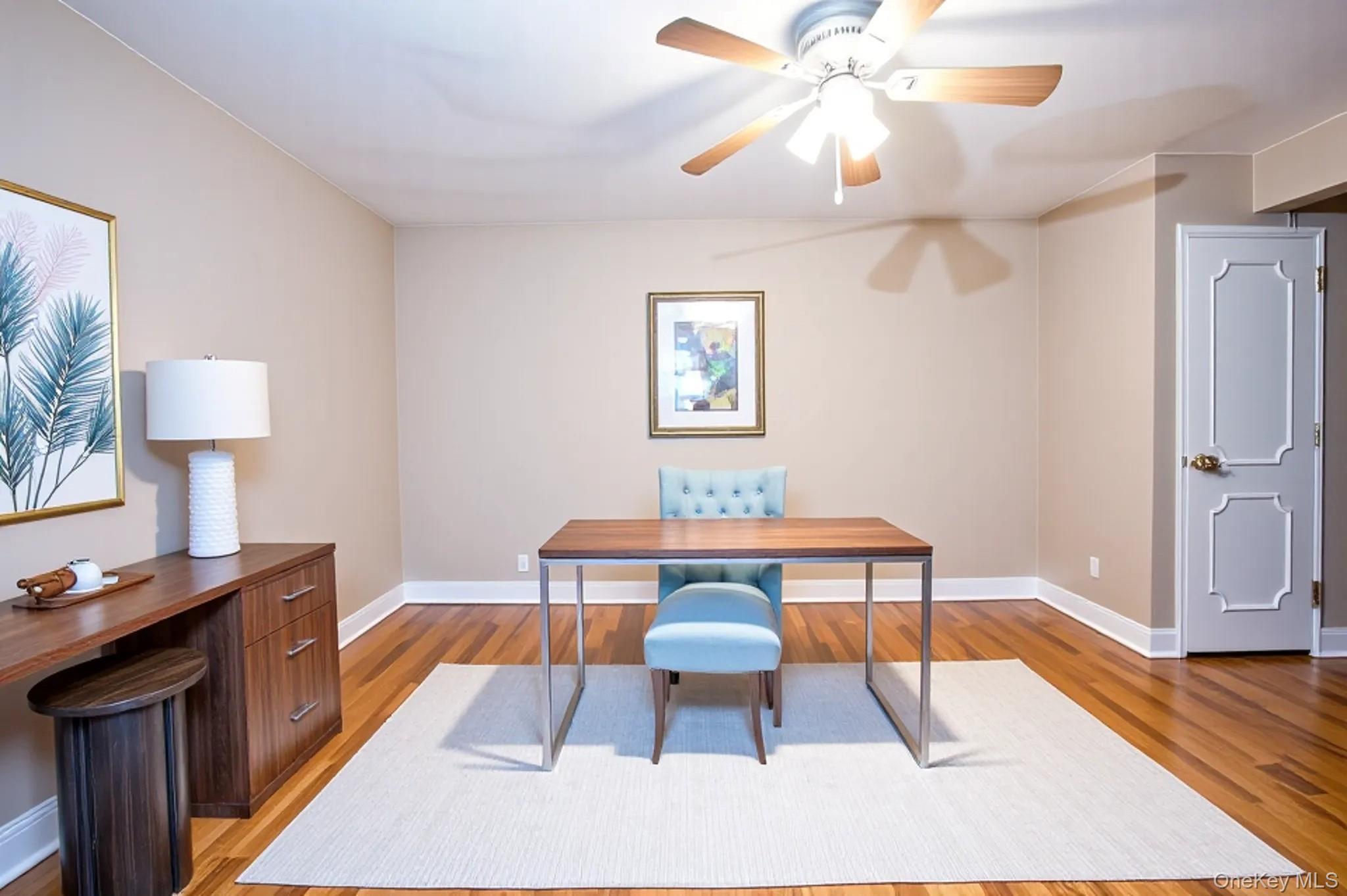 120 Dehaven Drive, Unit 629 Yonkers, NY 10703 - Photo 4 of 12 Home office featuring light wood-style flooring and ceiling fan
