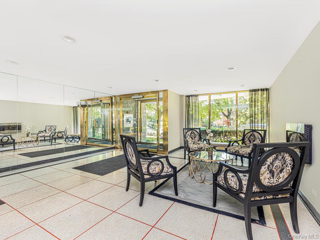 120 Dehaven Drive, Unit 629 Yonkers, NY 10703 - Photo 9 of 12 Dining area featuring recessed lighting, a wall of windows, speckled floor, and baseboards