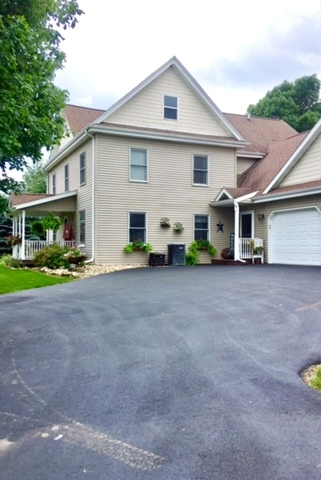 6166 Ogle Road Polo, IL 61064 - Photo 2 of 32 a view of house with outdoor space