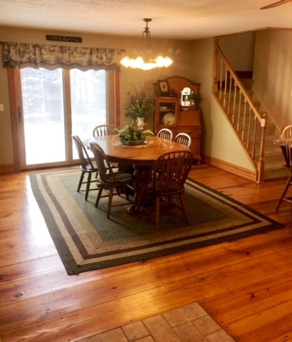 6166 Ogle Road Polo, IL 61064 - Photo 12 of 32 a view of a dining room with furniture window and wooden floor