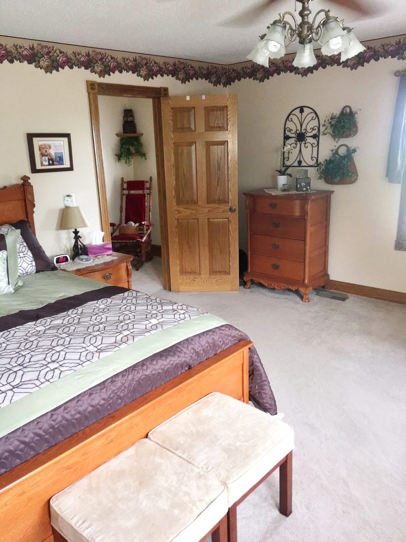 6166 Ogle Road Polo, IL 61064 - Photo 23 of 32 a living room with wooden floor