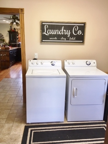 6166 Ogle Road Polo, IL 61064 - Photo 31 of 32 a utility room with dryer and washer