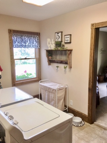 6166 Ogle Road Polo, IL 61064 - Photo 32 of 32 a bedroom with a bed and a tv on table