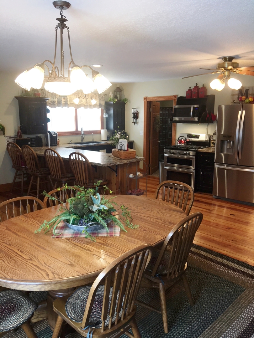 6166 Ogle Road Polo, IL 61064 - Photo 10 of 32 a view of a dining room with furniture