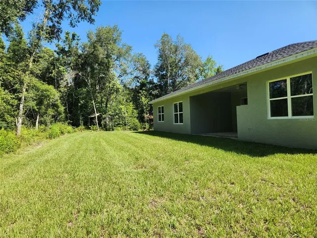 a house view with a garden space