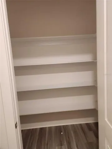 a view of small space with racks on the wall