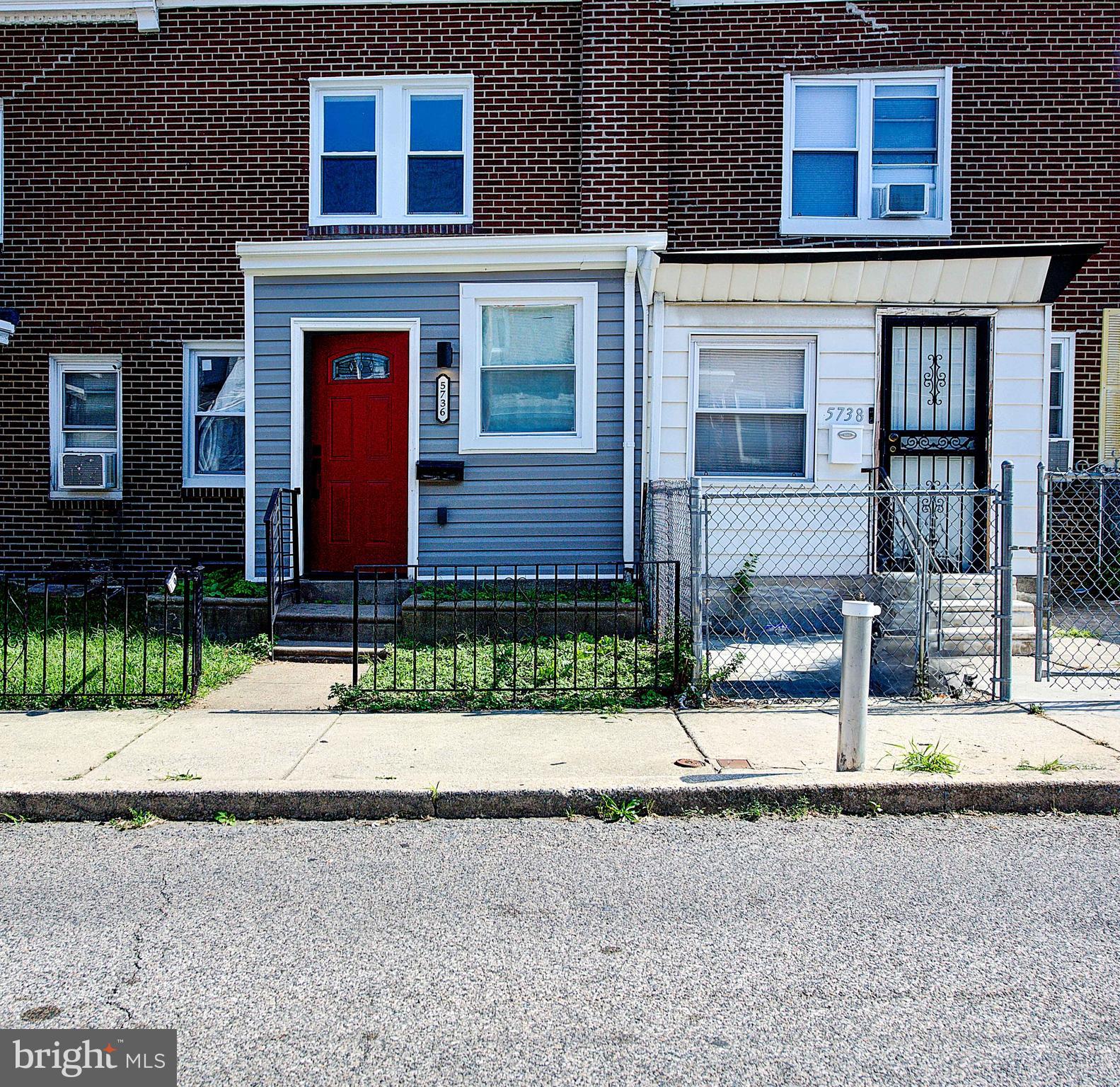 5736 Reedland Street Philadelphia, PA 19143 - Photo 22 of 22 a front view of a house with garden