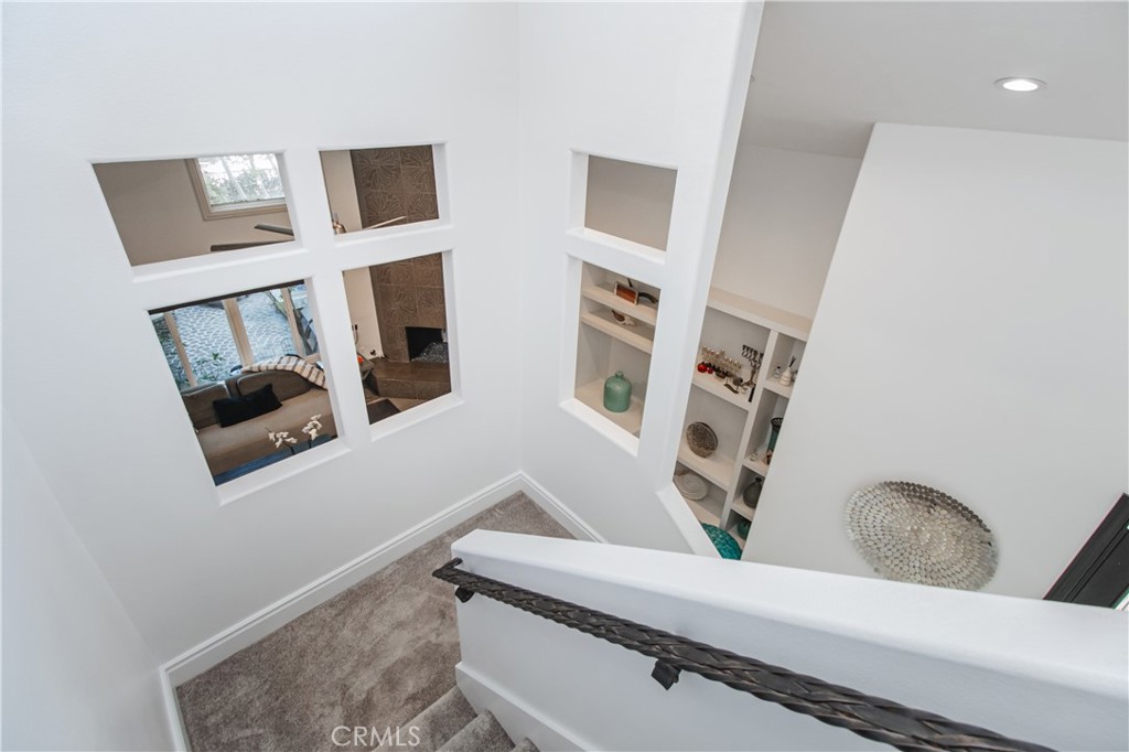 23057 Park Este Calabasas, CA 91302 - Photo 21 of 31 a living room with furniture and a painting on the wall
