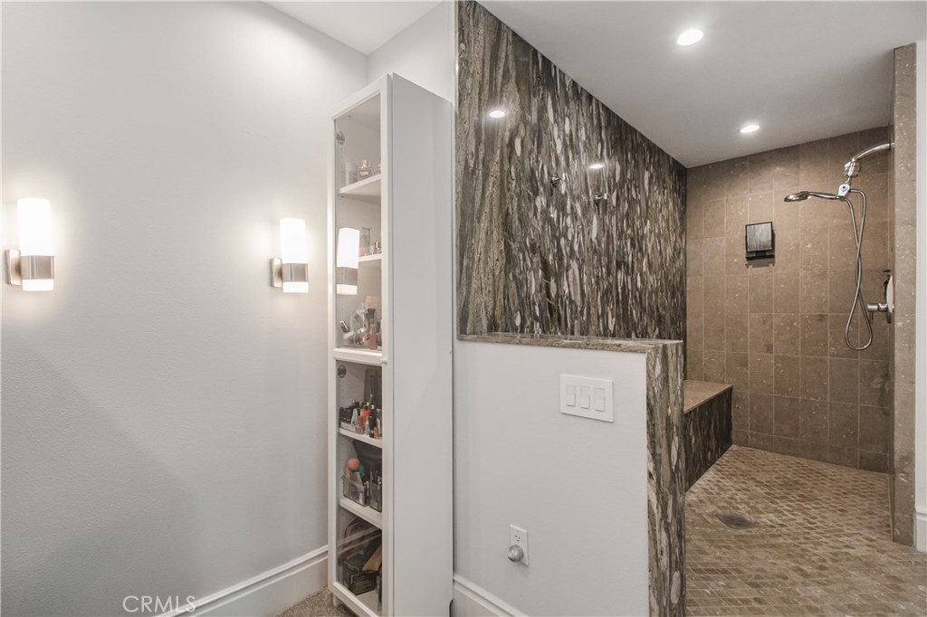 23057 Park Este Calabasas, CA 91302 - Photo 27 of 31 a bathroom with a shower and a sink