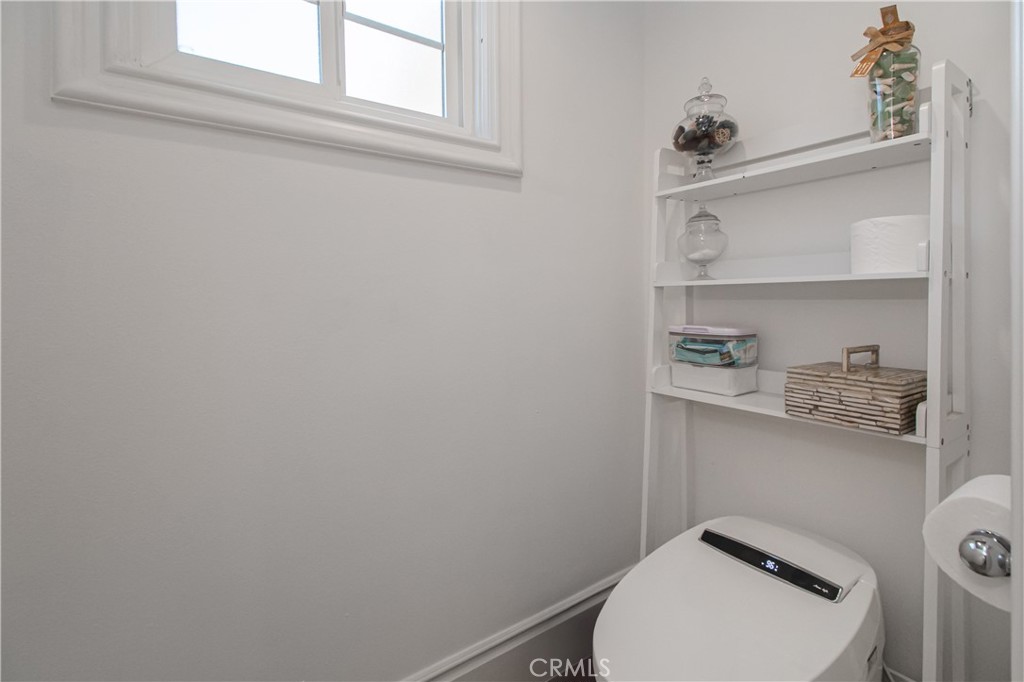 23057 Park Este Calabasas, CA 91302 - Photo 31 of 31 a white toilet sitting next to a window