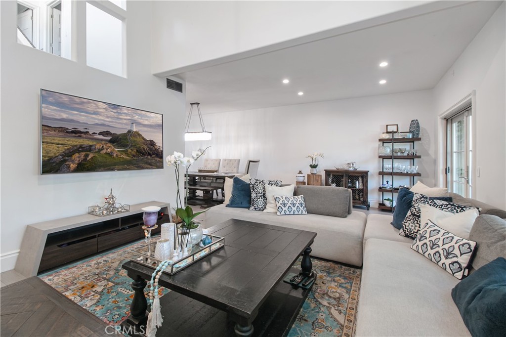 23057 Park Este Calabasas, CA 91302 - Photo 8 of 31 a living room with furniture and a flat screen tv