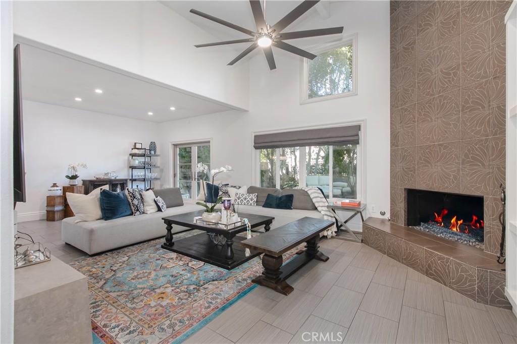 23057 Park Este Calabasas, CA 91302 - Photo 9 of 31 a living room with fireplace furniture and a fireplace