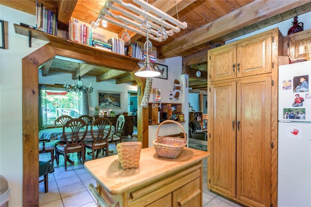187 Harris Road Minot, ME 04258 - Photo 17 of 35 view from kitchen to dining room,...