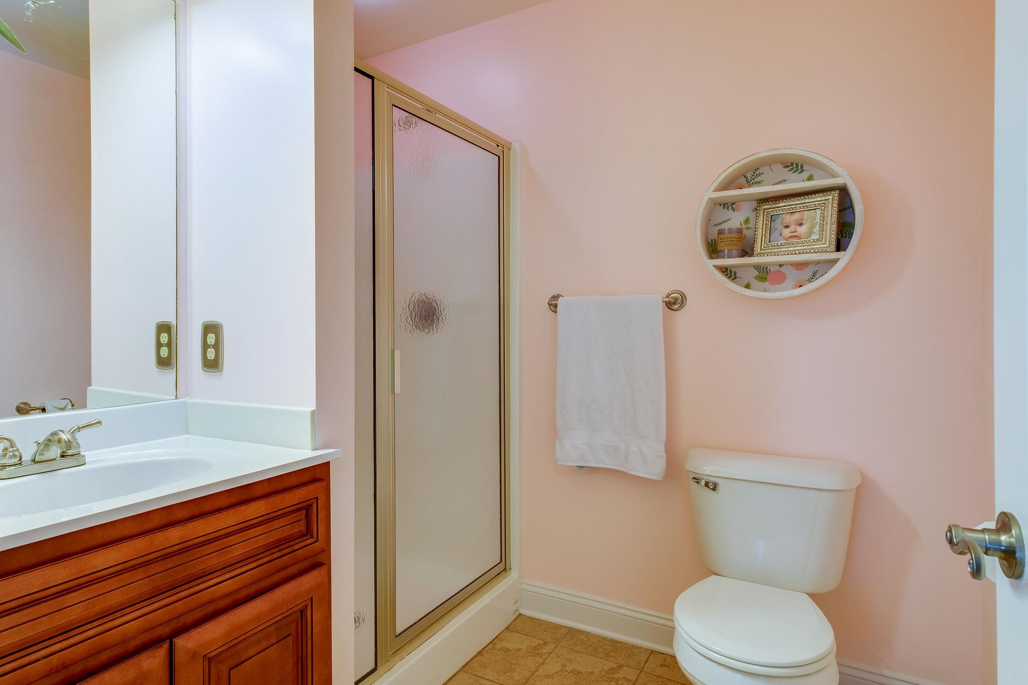 4110 Central Valley Road Murfreesboro, TN 37129 - Photo 18 of 30 En suite bathroom to 2nd bedroom and also features hallway access.