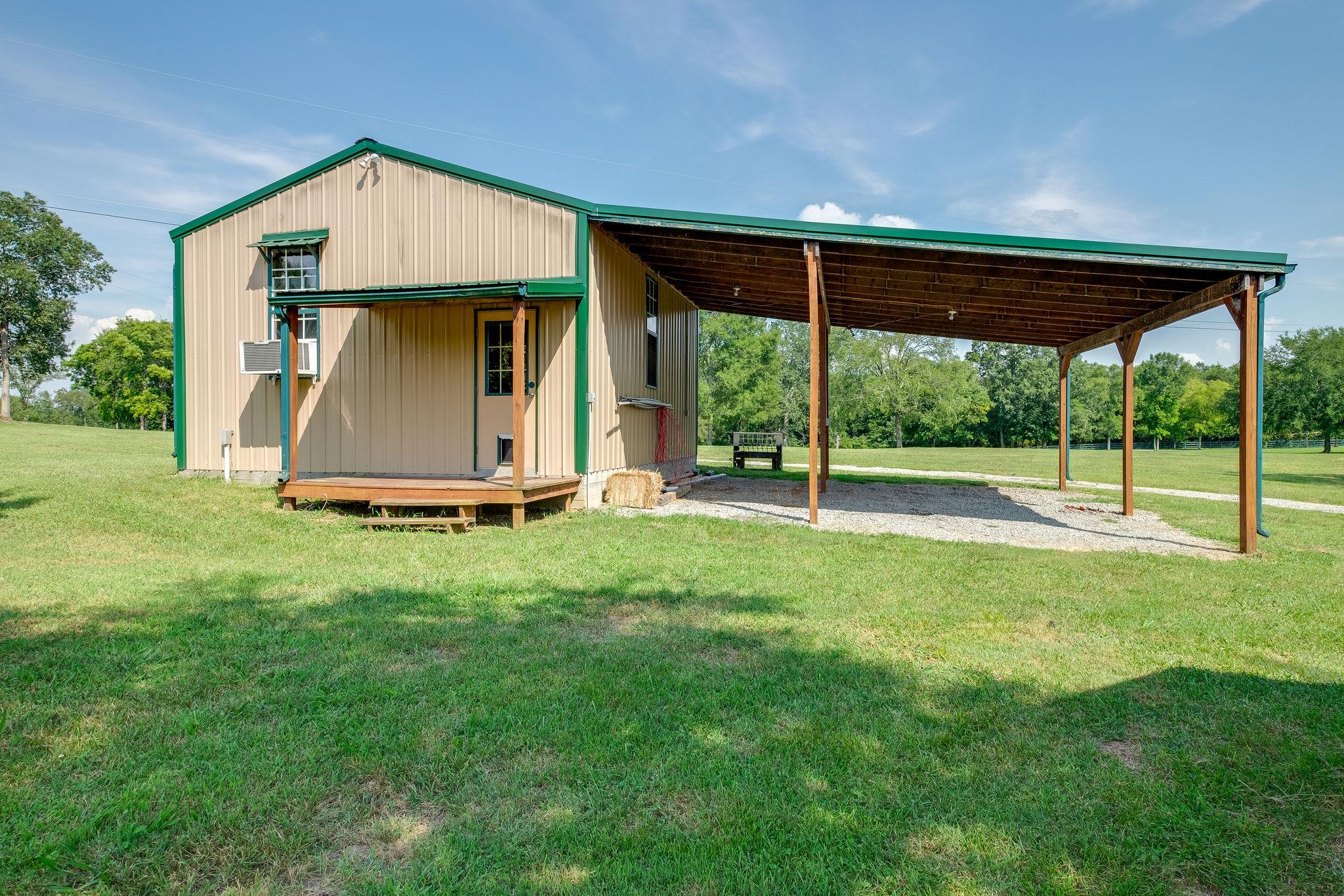 4110 Central Valley Road Murfreesboro, TN 37129 - Photo 26 of 30 Detached shop with extra covered parking space.