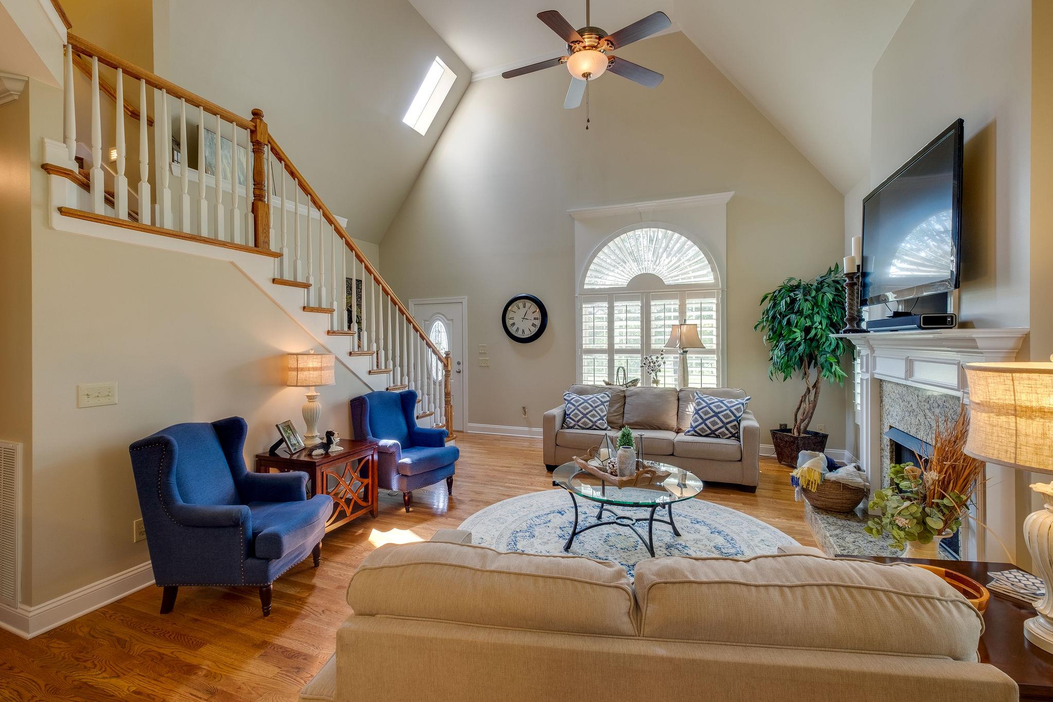 4110 Central Valley Road Murfreesboro, TN 37129 - Photo 5 of 30 Vaulted ceilings and gas fireplace create a grand entertaining room.