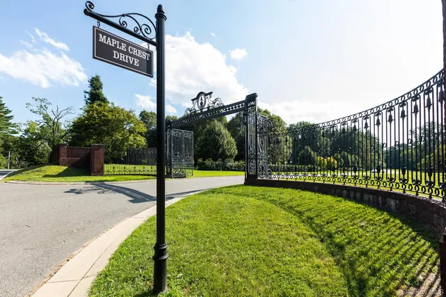 a view of a street with a sign board