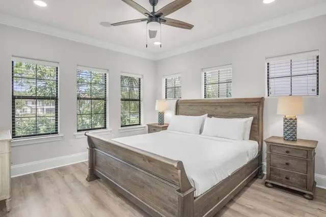 a bed room with a bed and a window