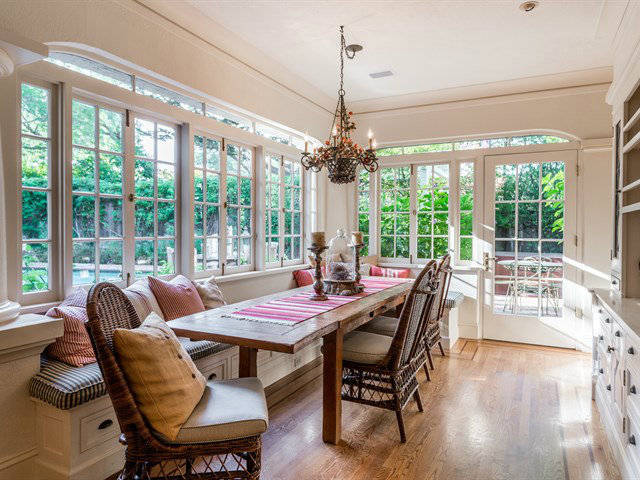 224 Warren Road San Mateo, CA 94402 - Photo 11 of 25 a dining room with furniture a chandelier and wooden floor