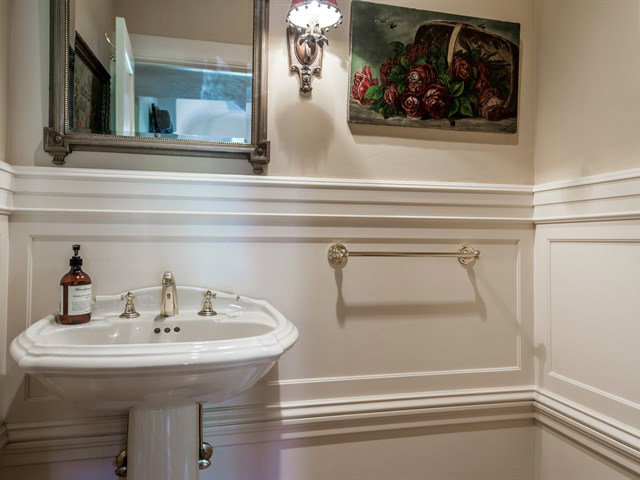 224 Warren Road San Mateo, CA 94402 - Photo 12 of 25 a bathroom with a sink and a mirror