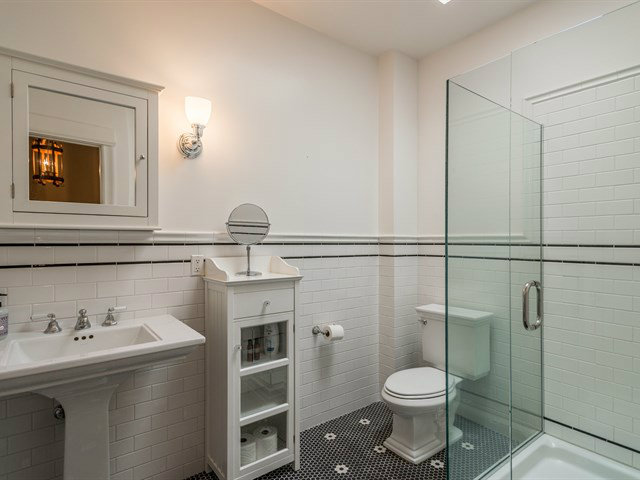 224 Warren Road San Mateo, CA 94402 - Photo 13 of 25 a bathroom with a sink toilet and shower