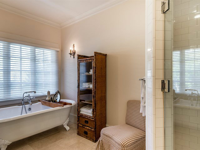 224 Warren Road San Mateo, CA 94402 - Photo 15 of 25 a spacious bathroom with a bathtub and next to a window