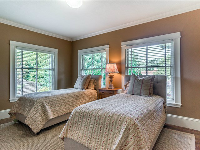 224 Warren Road San Mateo, CA 94402 - Photo 19 of 25 a bedroom with two beds and a large window