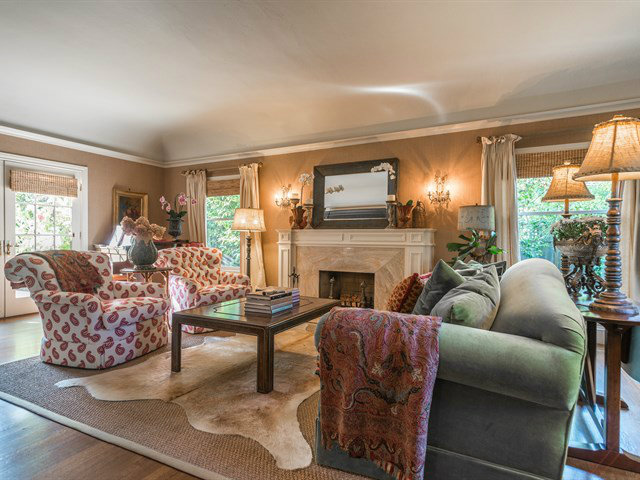 224 Warren Road San Mateo, CA 94402 - Photo 3 of 25 a living room with furniture a fireplace and a large window