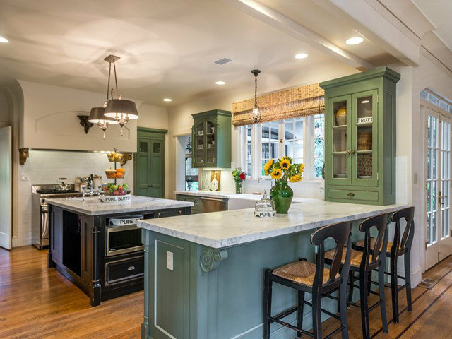 224 Warren Road San Mateo, CA 94402 - Photo 6 of 25 a kitchen with a table and chairs in it
