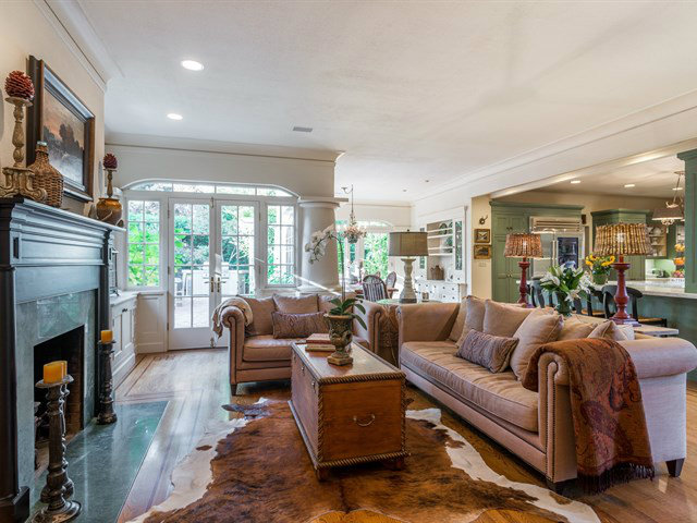 224 Warren Road San Mateo, CA 94402 - Photo 10 of 25 a living room with furniture and a fireplace