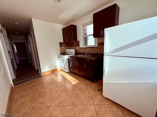 workspace with furniture and flat screen tv