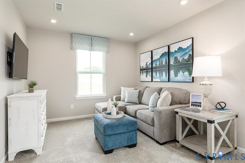 5 Driver Lane Richmond, VA 23223 - Photo 17 of 25 a living room with furniture and a flat screen tv