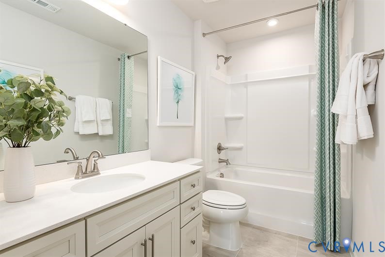 5 Driver Lane Richmond, VA 23223 - Photo 25 of 25 a bathroom with a sink a toilet and shower