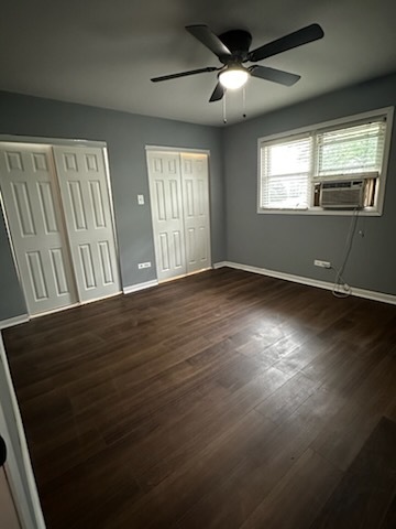11036 Kilpatrick Avenue, Unit 3SW Oak Lawn, IL 60453 - Photo 6 of 9 a view of an empty room with a window and wooden floor