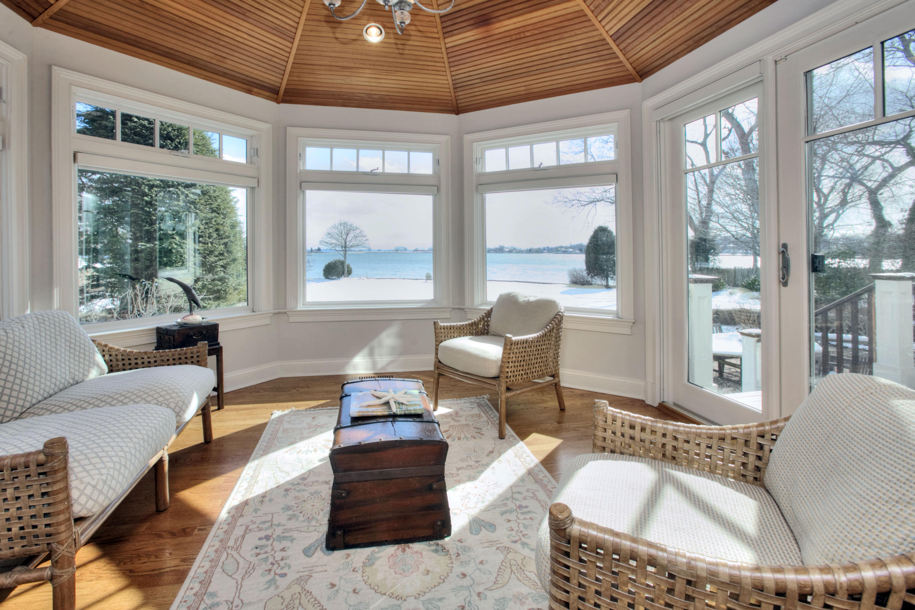 9 Seagate Road Darien, CT 06820 - Photo 12 of 32 a living room with furniture and a large window