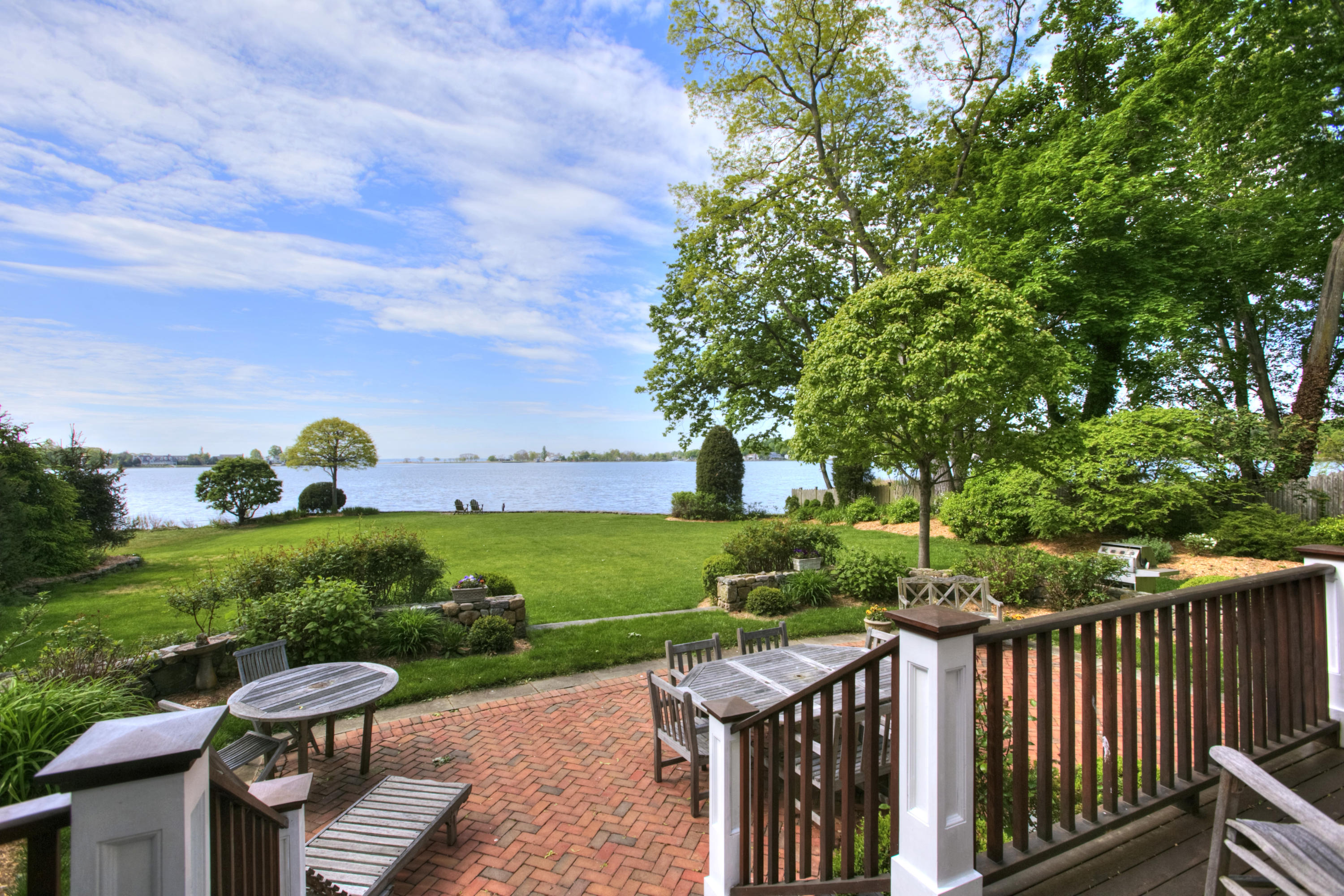 9 Seagate Road Darien, CT 06820 - Photo 30 of 32 a view of a two chair and table in the garden