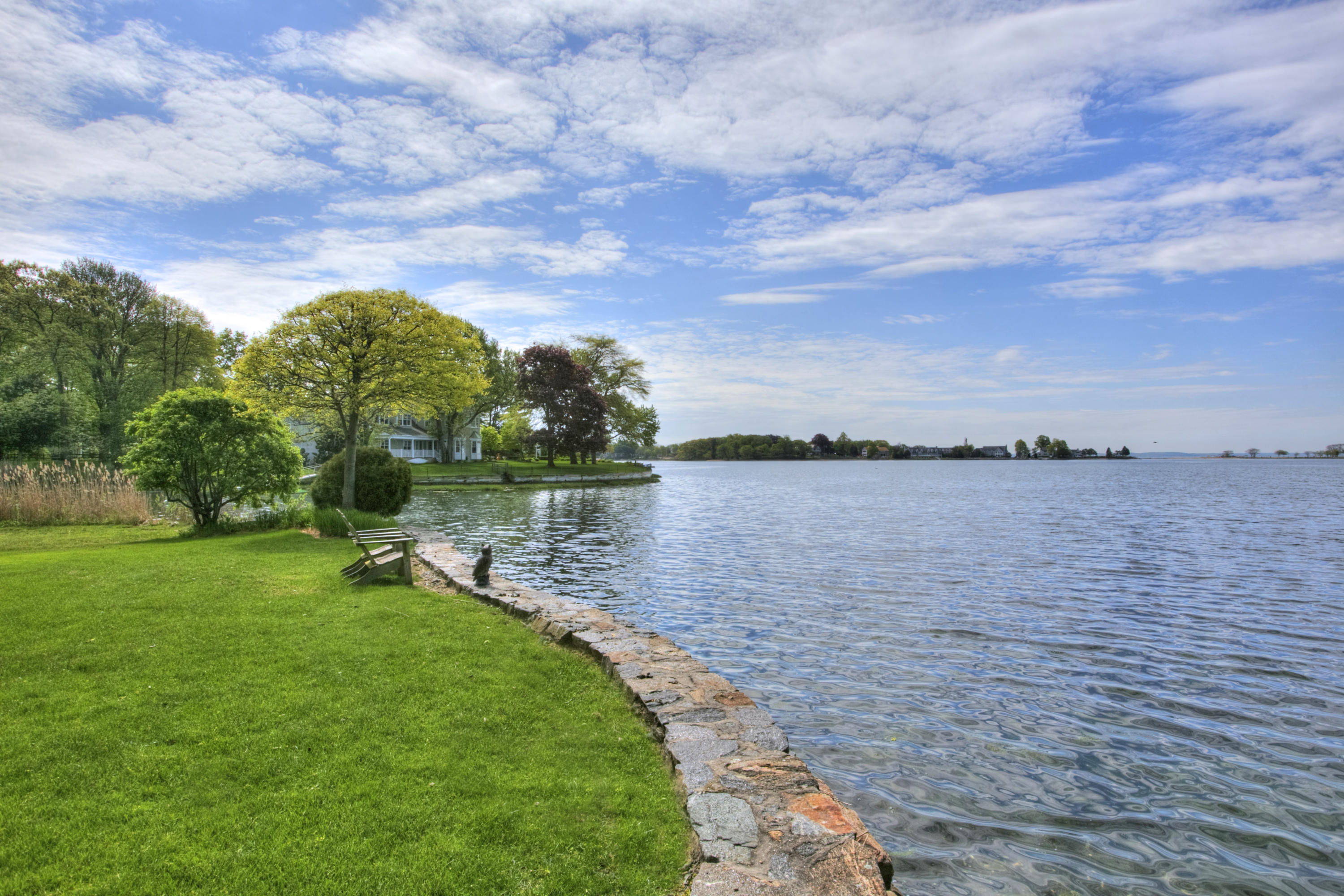 9 Seagate Road Darien, CT 06820 - Photo 4 of 32 a view of a lake from a yard